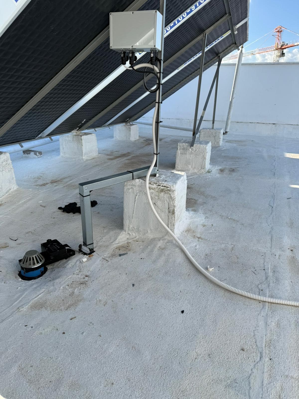 SmartFlow rooftop installation showing control box and roof valve